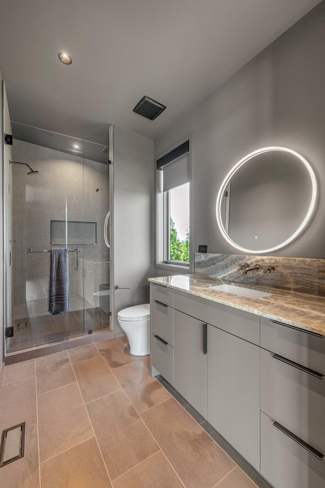 8005 Backwoods Dr, College Grove, TN 37046 - bathroom with vanity, a shower stall, and recessed lighting