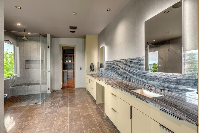 8005 Backwoods Dr, College Grove, TN 37046 - full bath featuring double vanity, a shower stall, decorative backsplash, and recessed lighting