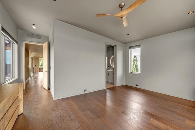 8005 Backwoods Dr, College Grove, TN 37046 - empty room featuring plenty of natural light, ceiling fan, wood finished floors, and recessed lighting