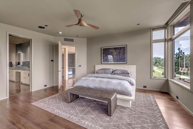8005 Backwoods Dr, College Grove, TN 37046 - bedroom featuring wood finished floors, recessed lighting, ensuite bath, and a ceiling fan
