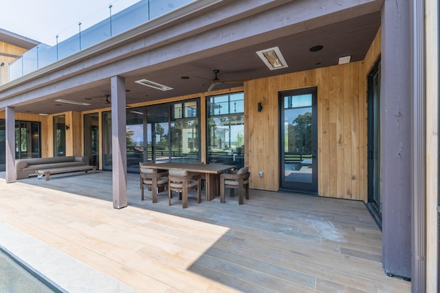 8005 Backwoods Dr, College Grove, TN 37046 - wooden deck featuring ceiling fan and outdoor dining area