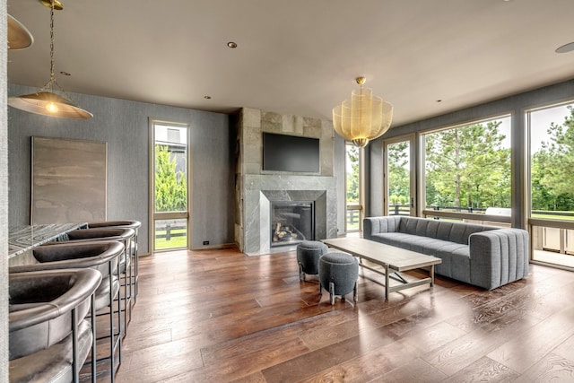8005 Backwoods Dr, College Grove, TN 37046 - living room featuring hardwood / wood-style flooring, plenty of natural light, and a premium fireplace