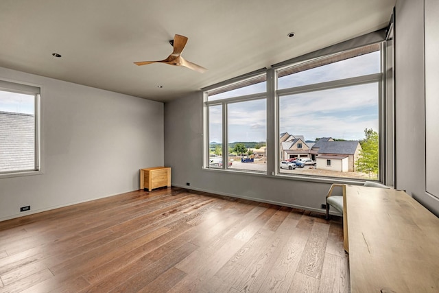 8005 Backwoods Dr, College Grove, TN 37046 - empty room with wood finished floors and a ceiling fan
