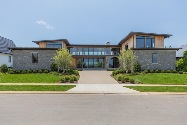 8005 Backwoods Dr, College Grove, TN 37046 - view of front of house featuring stone siding and a front lawn