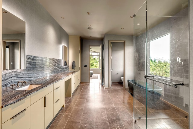 8005 Backwoods Dr, College Grove, TN 37046 - full bath with vanity, decorative backsplash, a shower stall, and recessed lighting