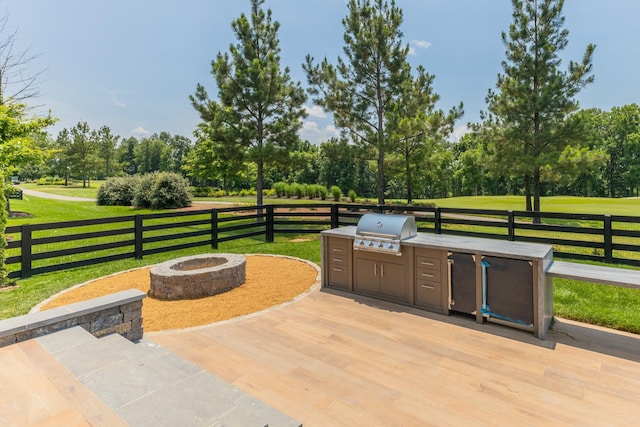8005 Backwoods Dr, College Grove, TN 37046 - view of patio / terrace featuring an outdoor fire pit, exterior kitchen, view of wooded area, and golf course view