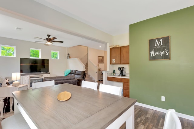 5 Oak Ridge Ct NE, Rome, GA 30165 - dining area featuring stairs, dark wood-style flooring, and a ceiling fan