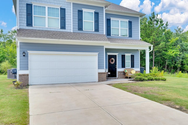 5 Oak Ridge Ct NE, Rome, GA 30165 - craftsman-style house featuring a front yard, an attached garage, concrete driveway, a shingled roof, and brick siding