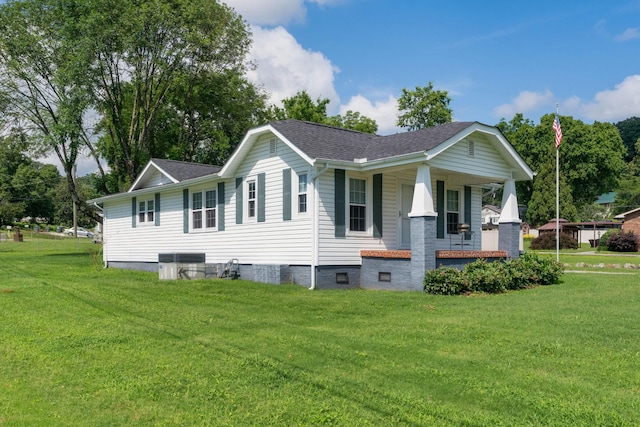 3502 Kellys Ferry Rd, Chattanooga, TN 37419 - view of home's exterior with covered porch, a lawn, and a shingled roof