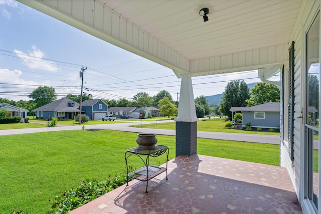 3502 Kellys Ferry Rd, Chattanooga, TN 37419 - covered porch with a lawn and a residential view