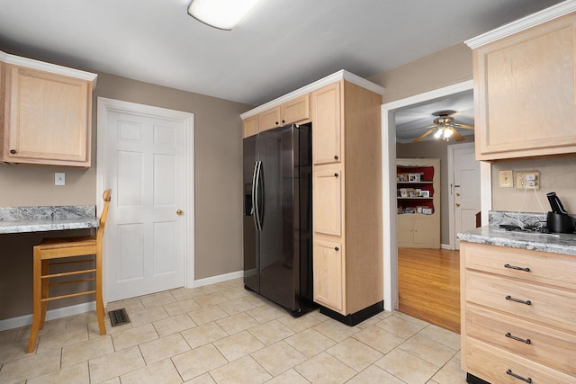 3502 Kellys Ferry Rd, Chattanooga, TN 37419 - kitchen featuring fridge with ice dispenser, light brown cabinets, a ceiling fan, light stone counters, and light tile patterned floors