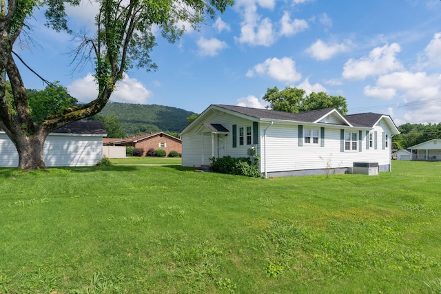 3502 Kellys Ferry Rd, Chattanooga, TN 37419 - rear view of house with a lawn and a mountain view