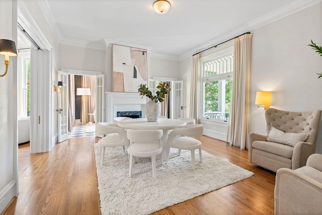 1504 Sweetbriar Ave, Nashville, TN 37212 - living area featuring crown molding, a high end fireplace, and light wood-style floors