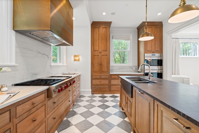 1504 Sweetbriar Ave, Nashville, TN 37212 - kitchen featuring exhaust hood, stainless steel appliances, light flooring, backsplash, and recessed lighting