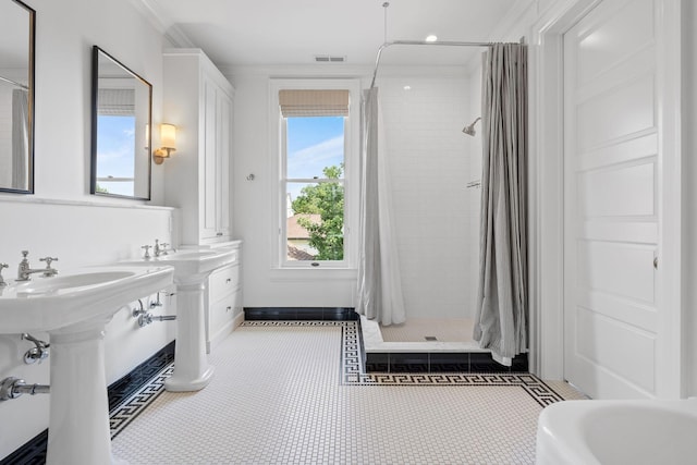 1504 Sweetbriar Ave, Nashville, TN 37212 - bathroom with a shower stall and ornamental molding