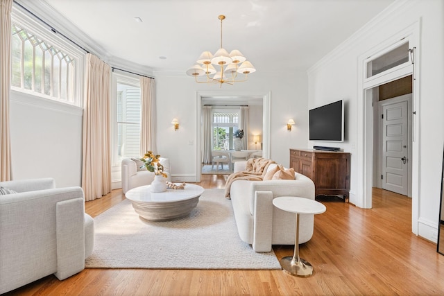 1504 Sweetbriar Ave, Nashville, TN 37212 - living room featuring a chandelier, ornamental molding, and wood finished floors