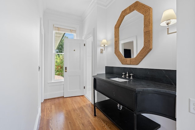 1504 Sweetbriar Ave, Nashville, TN 37212 - bathroom featuring ornamental molding, wood finished floors, and vanity