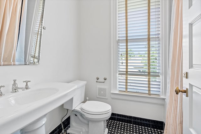1504 Sweetbriar Ave, Nashville, TN 37212 - bathroom featuring toilet and tile patterned flooring
