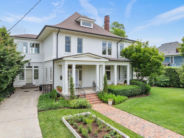 1504 Sweetbriar Ave, Nashville, TN 37212 - traditional style home with a chimney, a front lawn, a porch, and a shingled roof