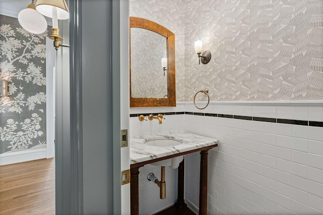 1504 Sweetbriar Ave, Nashville, TN 37212 - bathroom with wallpapered walls, wood finished floors, and wainscoting