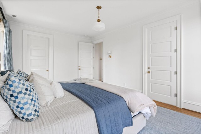 1504 Sweetbriar Ave, Nashville, TN 37212 - bedroom featuring wood finished floors and ornamental molding