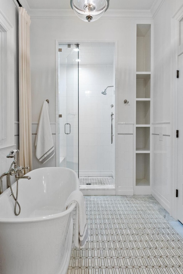 1504 Sweetbriar Ave, Nashville, TN 37212 - full bathroom featuring crown molding, a stall shower, a soaking tub, and built in shelves
