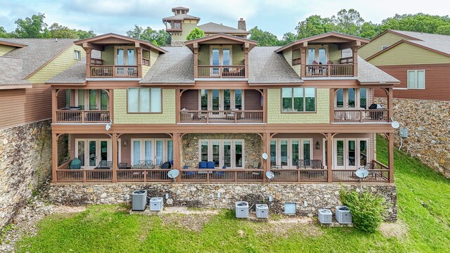 55B Oasis Ln, Savannah, TN 38372 - back of house featuring french doors, a balcony, roof with shingles, a lawn, and a chimney
