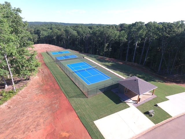 55B Oasis Ln, Savannah, TN 38372 - view of tennis court with a view of trees