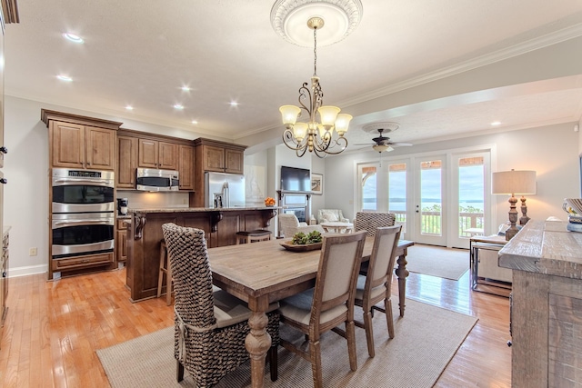 55B Oasis Ln, Savannah, TN 38372 - dining space featuring a chandelier, light wood-type flooring, crown molding, a ceiling fan, and recessed lighting