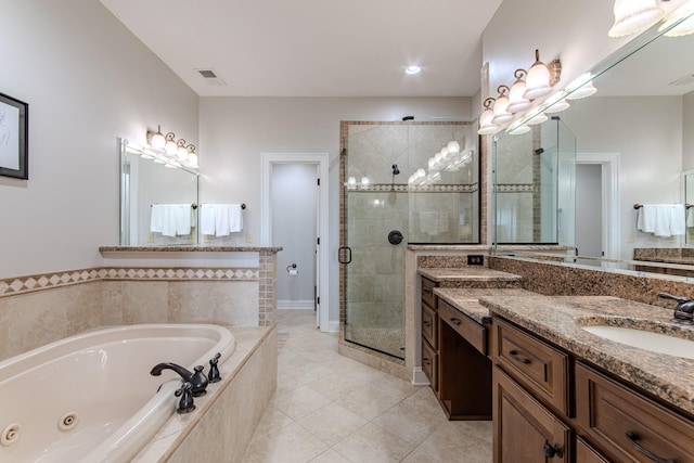 55B Oasis Ln, Savannah, TN 38372 - full bathroom with a shower stall, vanity, a tub with jets, and tile patterned floors