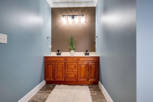 264 Firetower Rd, Dickson, TN 37055 - bathroom featuring wood finish floors, crown molding, and double vanity