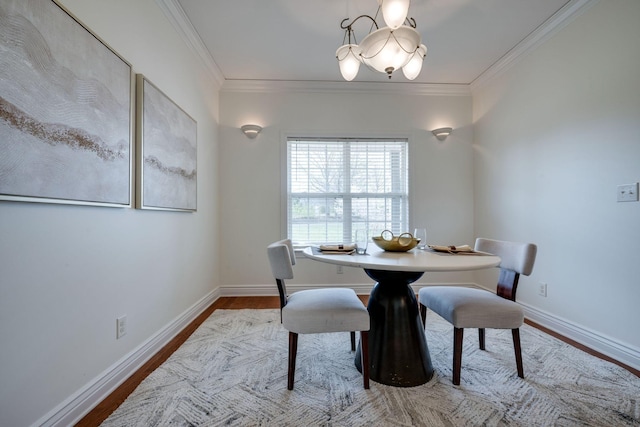 264 Firetower Rd, Dickson, TN 37055 - dining room with wood finished floors, a chandelier, and crown molding