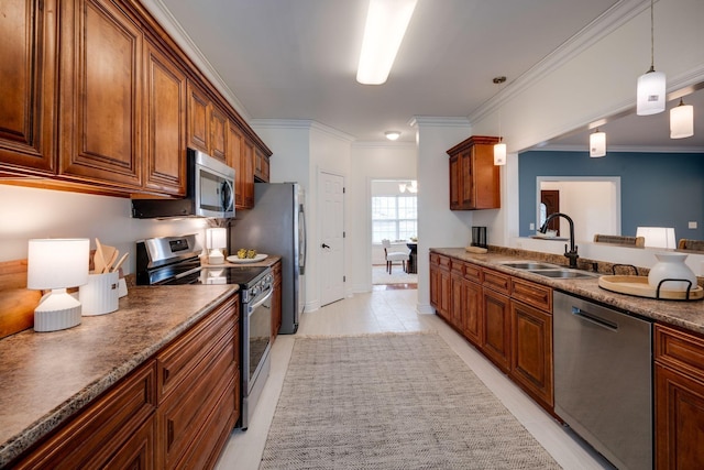 264 Firetower Rd, Dickson, TN 37055 - kitchen with appliances with stainless steel finishes, brown cabinetry, decorative light fixtures, ornamental molding, and dark countertops