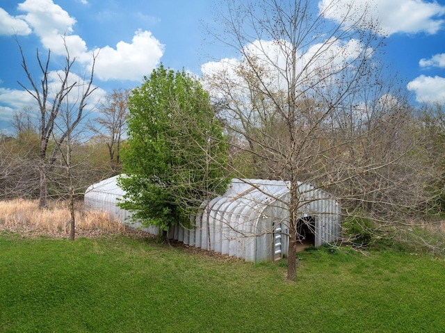 264 Firetower Rd, Dickson, TN 37055 - view of green lawn featuring an outbuilding