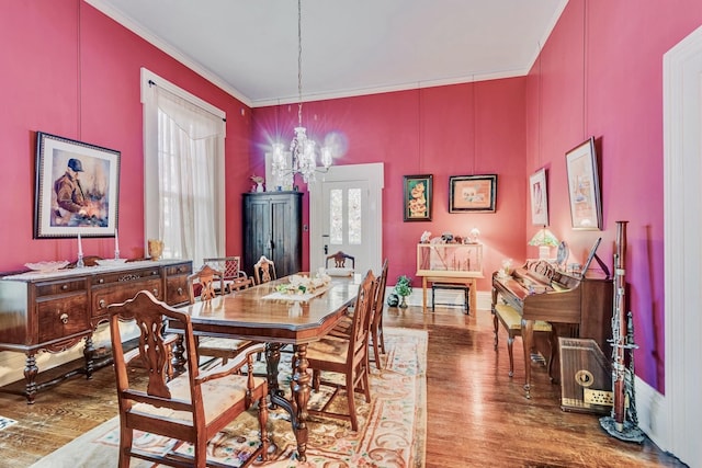 607 N 2nd St N, Clarksville, TN 37040 - dining space featuring a chandelier, wood finished floors, and crown molding
