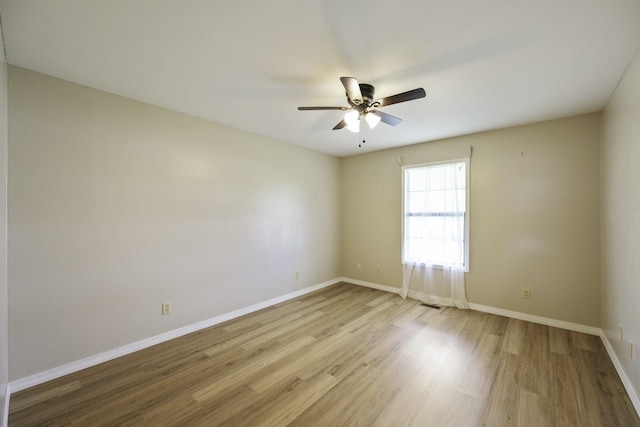 17930 Main St W, Huntingdon, TN 38344 - empty room with wood finished floors and ceiling fan