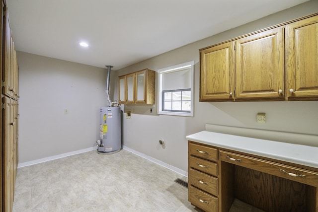 17930 Main St W, Huntingdon, TN 38344 - unfurnished office with water heater, built in desk, light flooring, and recessed lighting