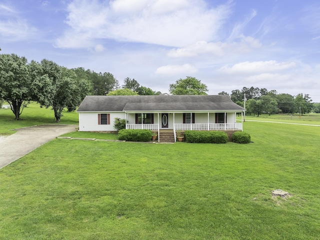 17930 Main St W, Huntingdon, TN 38344 - single story home with covered porch, driveway, a front yard, and roof with shingles