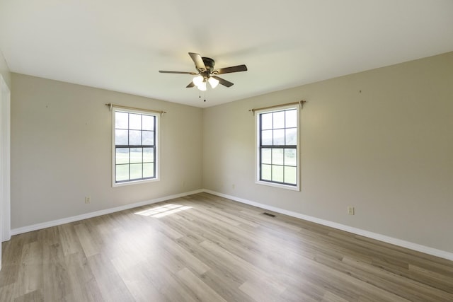 17930 Main St W, Huntingdon, TN 38344 - unfurnished room featuring plenty of natural light, a ceiling fan, and light wood-style flooring