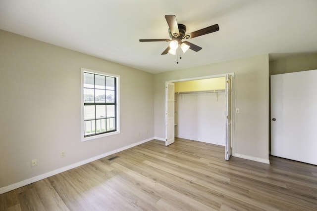 17930 Main St W, Huntingdon, TN 38344 - unfurnished bedroom with light wood-style flooring, a closet, and a ceiling fan
