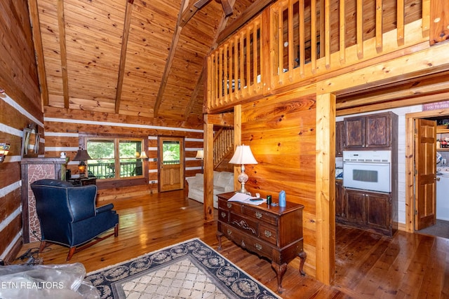 311 Domar Dr, Townsend, TN 37882 - living area featuring hardwood / wood-style flooring, a wood ceiling with exposed beams, high vaulted ceiling, and wooden walls
