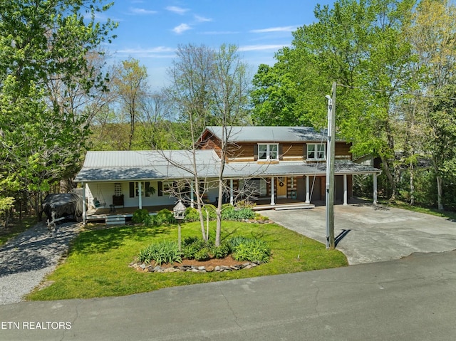 7539 W Old Highway 73, Townsend, TN 37882 - view of front facade with covered porch, concrete driveway, and a front lawn