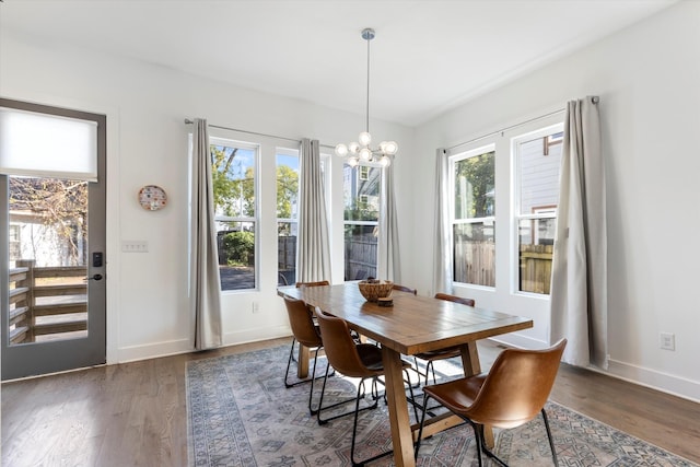 201 Prince Ave Unit B, Nashville, TN 37207 - dining area featuring plenty of natural light, wood finished floors, and a chandelier
