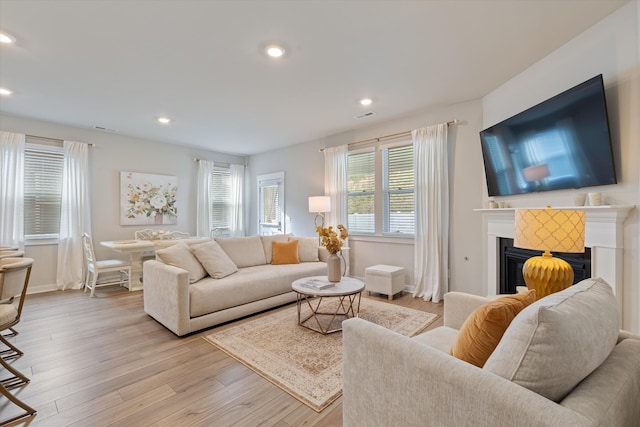 1081 Pebble Run Rd, Hendersonville, TN 37075 - living room with a fireplace, light wood-style floors, and recessed lighting