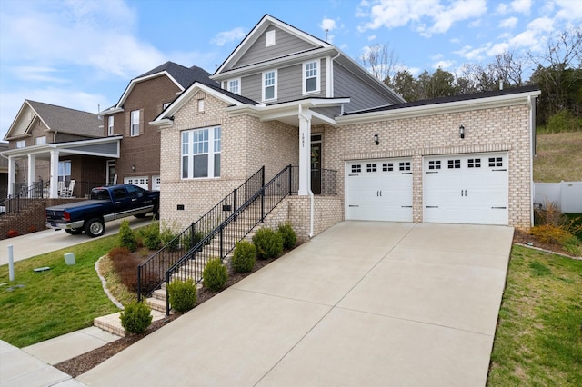 1081 Pebble Run Rd, Hendersonville, TN 37075 - view of front of house with concrete driveway, a front lawn, brick siding, and an attached garage