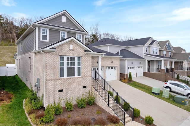 1081 Pebble Run Rd, Hendersonville, TN 37075 - view of front of property with brick siding, driveway, an attached garage, crawl space, and a residential view