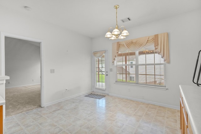 219 Wyndom Ct, Goodlettsville, TN 37072 - unfurnished dining area with a chandelier and baseboards