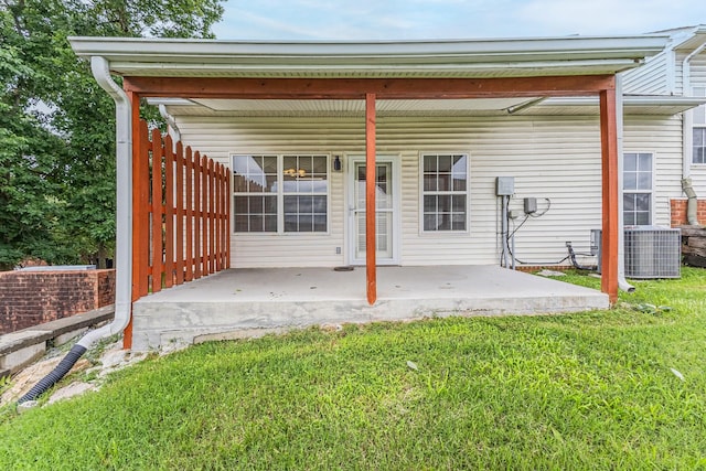 219 Wyndom Ct, Goodlettsville, TN 37072 - rear view of property featuring a lawn and a patio