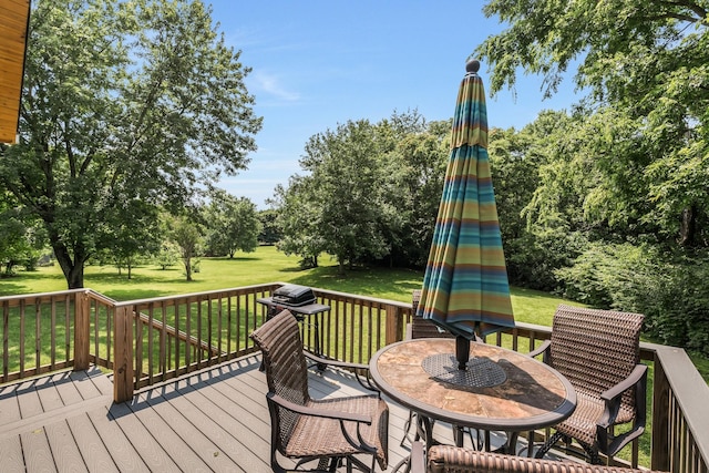 513 Barrington Dr, Franklin, TN 37067 - deck with outdoor dining space, a yard, and view of wooded area