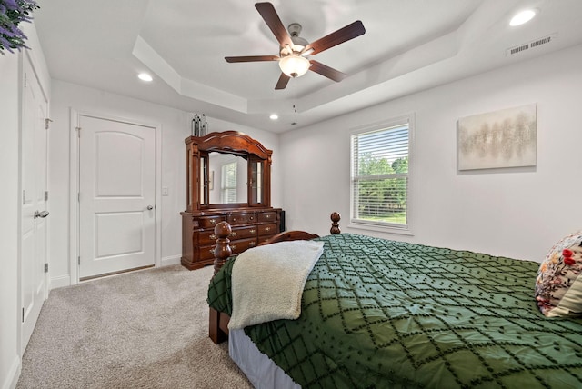 4049 Sadie Grace Way NW, Clarksville, TN 37042 - bedroom featuring a tray ceiling, light colored carpet, recessed lighting, and ceiling fan